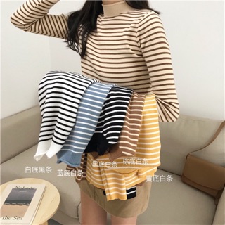 Áo len kẻ cổ xoắn
