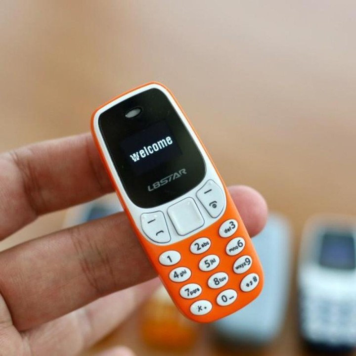 Điện thoại Nokia mini 3310 siêu nhỏ 2 sim 2 sóng,hỗ trợ blutooth ,mp3, thẻ nhớ,thay đổi giọng nói , bảo hành 12 tháng