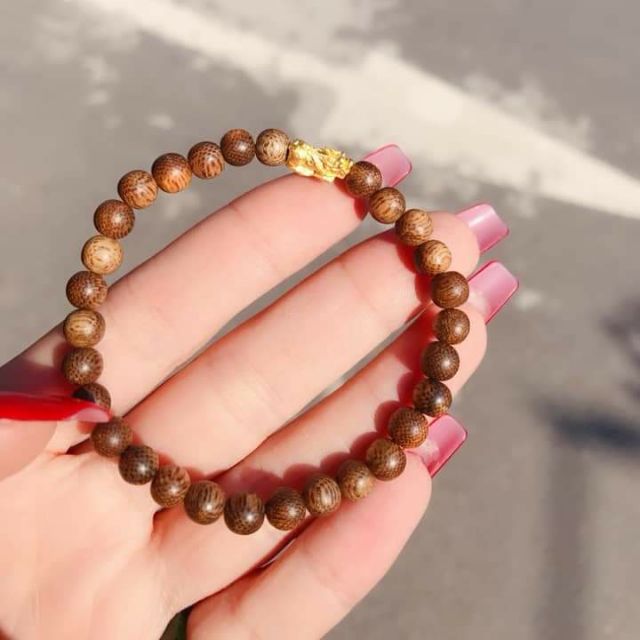 Vòng tay trầm hương tỳ hưu vàng 6mm