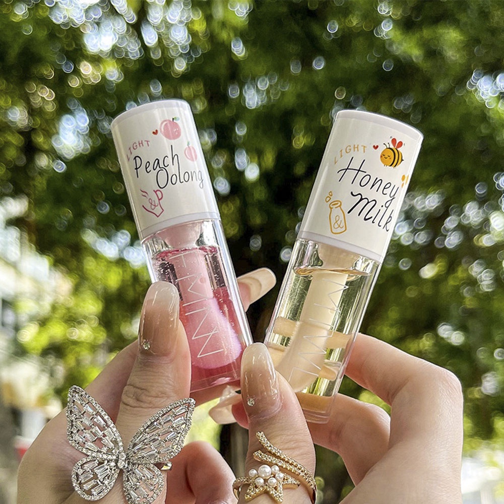 Honey Milk Moisturizes Desalinates Oil Lip Plumper Moist Lips Protection Essence Lipstick Makeup