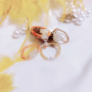 Set 4 nhẫn nữ hạt cườm tone cam phong cách Hàn