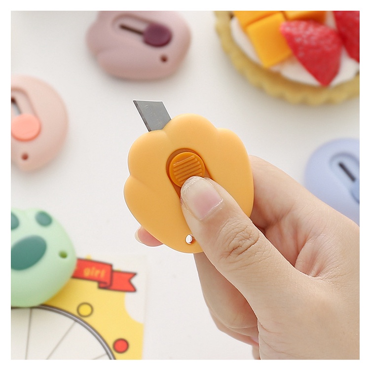 Dao rọc giấy hình dấu chân mèo xinh xắn
