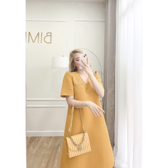 ĐẦM CỔ V KEM TAG NƠ - BIMI