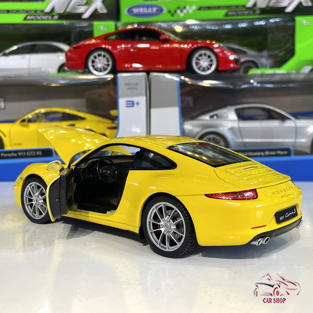 Mô hình xe ô tô Porsche 911 Carrera S Hãng Welly tỉ lệ 1:24 màu vàng