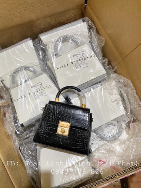 - Túi xách khuy tròn xuất dư