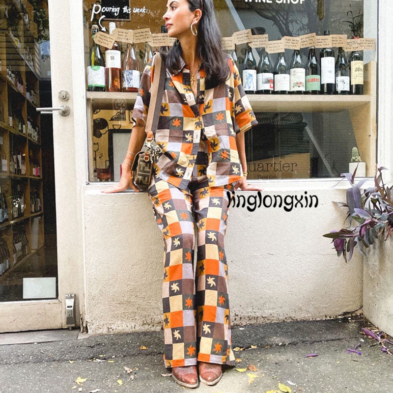 Bộ Đồ 2 Món Áo Sơ Mi Tay Ngắn Cổ Bẻ Cài Nút Kèm Quần Dài Dáng Rộng Thời Trang Mùa Hè Cho Nữ