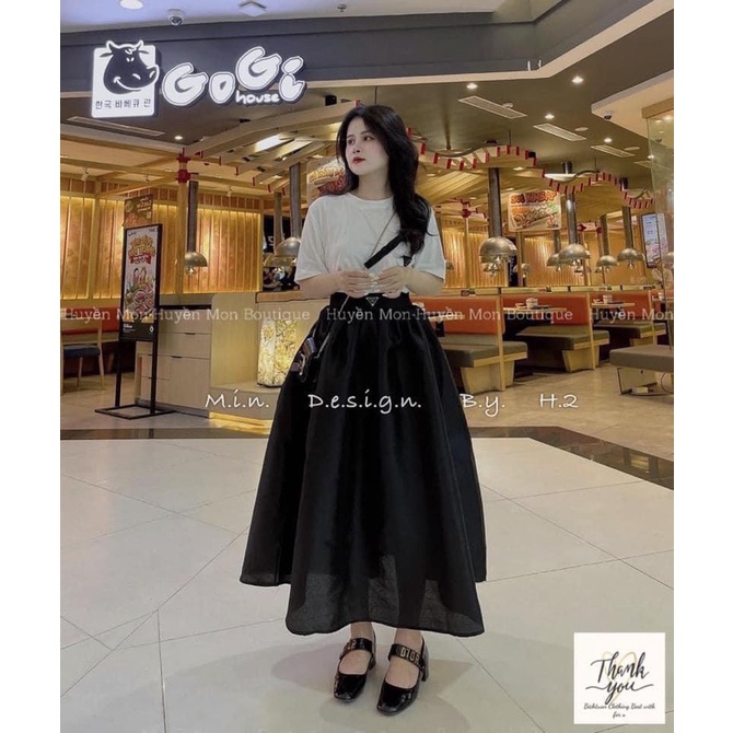 SET ÁO LOGO PRADA ĐÍNH NƠ ĐEN MIX CHÂN VÁY XẾP LY ĐEN