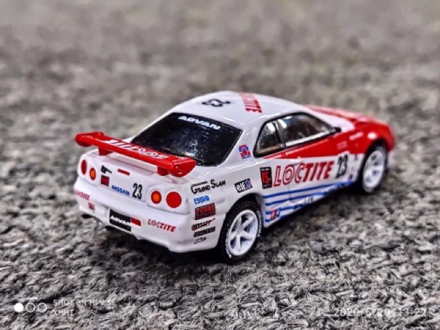 Xe Mô Hình Nissan Skyline GT-R (BNR34) 1999 1:64 GreenLight ( Trắng Đỏ )