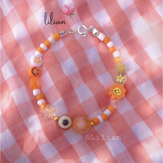 Vòng tay hạt cườm mix charm màu sắc Lilian