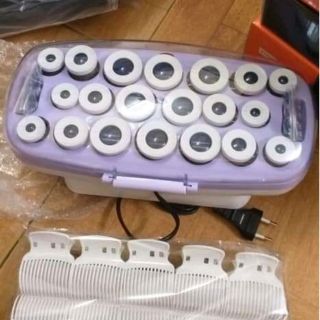 Máy uốn lô tóc nó