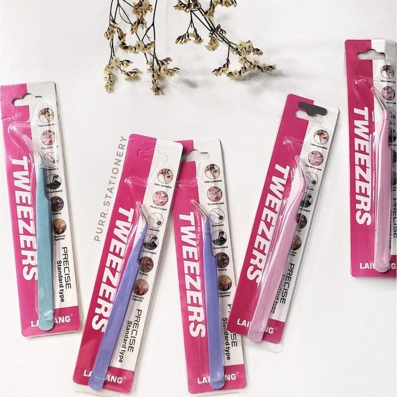 Nhíp gắp đá và hình dán móng