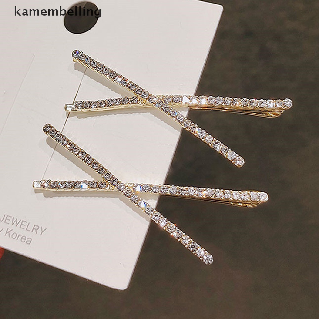 Set 2 kẹp tóc chữ X đính đá pha lê đơn giản
