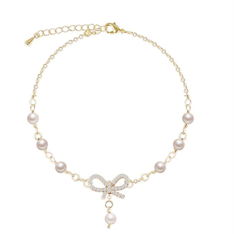 Vòng Tay Đính Ngọc Trai Và Nơ Xinh Xắn Thời Trang Cho Nữ