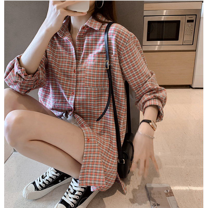 Áo sơ mi nữ tay dài dáng rộng in họa tiết kẻ sọc