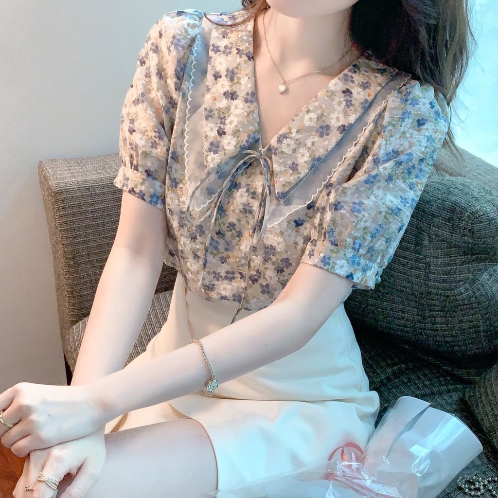 Sweet temperament chiffon girl summer 2022 new doll collar short-sleeved blouse design niche shirt