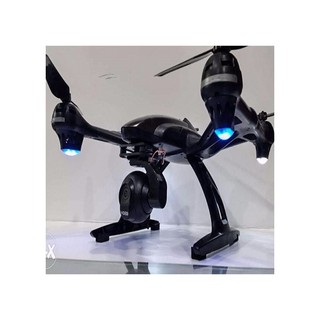 Flycam tự động bay về ,camera có chống rung và 2 pin