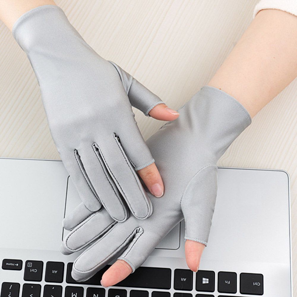 Đôi găng tay hở ngón mềm mại thoáng khí chống tia UV cho nam nữ