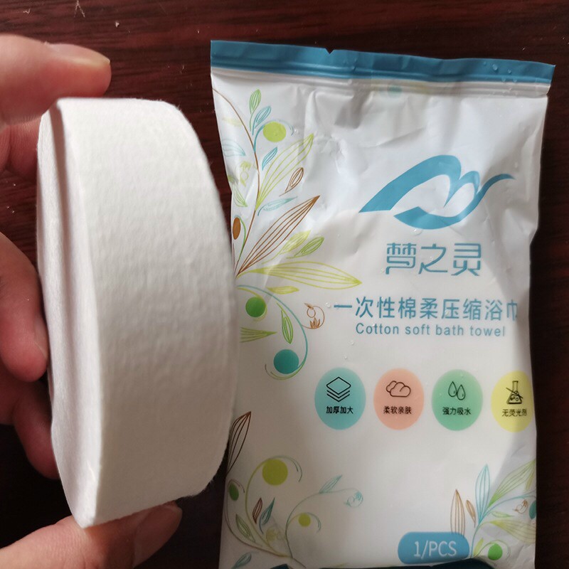 Khăn tắm nén (140 x 70cm)  sử dụng được nhiều lần, chất liệu cotton 100