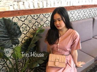Váy kẻ caro thắt nơ sau