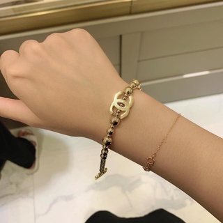 Lắc tay Bi titan hiệu không rỉ