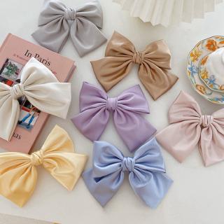 Kẹp tóc nơ màu trơn thanh lịch cho nữ