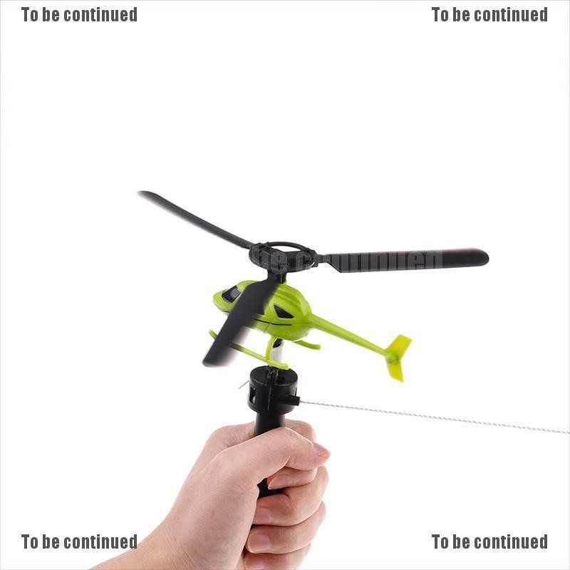 Máy bay trực thăng đồ chơi kéo lên dây cót vui nhộn dành cho bé
