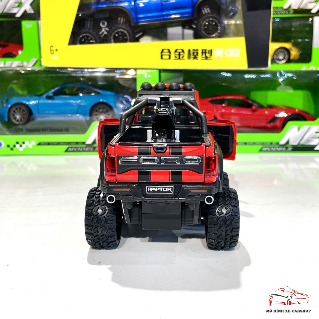 Mô hình xe ô tô Ford F150 Raptor 6x6 tỉ lệ 1:28 màu đỏ