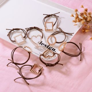 Dây cột tóc đính hạt ngọc nhỏ xinh iu M02