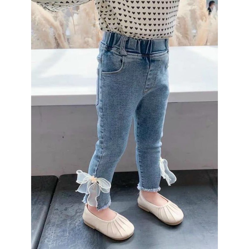 quần loe gắn nơ lụa cho bé