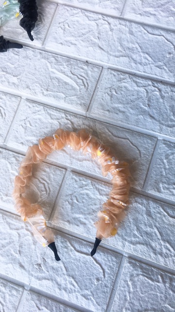 Bờm tóc hoa cúc hot trend