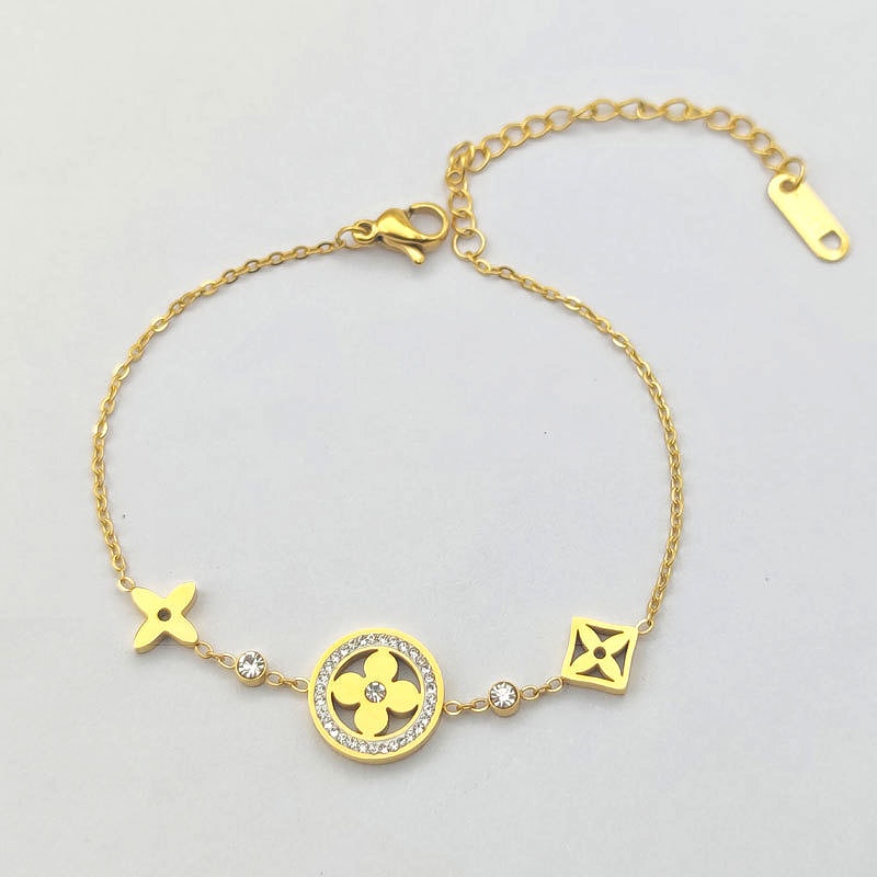 Lắc tay titan nữ không gỉ mặt cỏ 4 lá xinh xắn trang sức titan cao cấp thiết kế thời trang thanh lịch mẫu mới