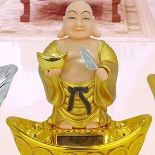 Phật di lạc ngồi trên thỏi vàng năng lượng