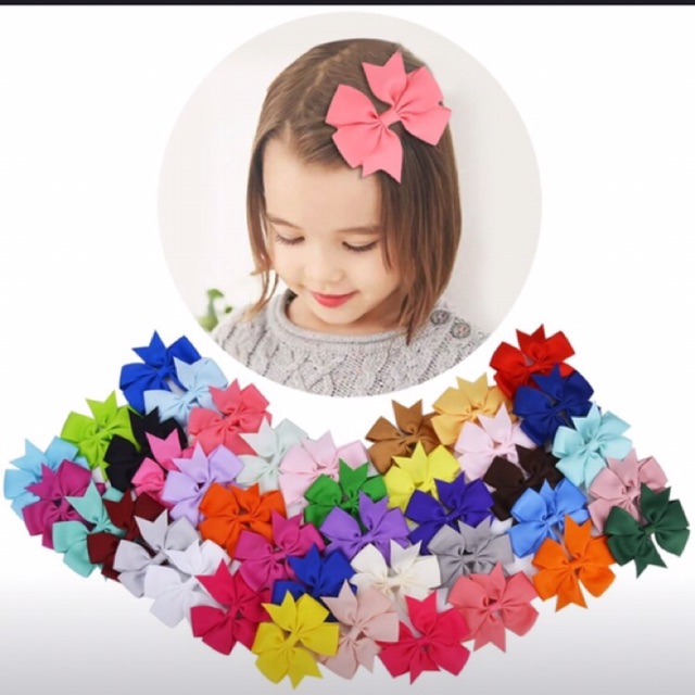 B140 - Kẹp tóc nơ màu trơn bé gái