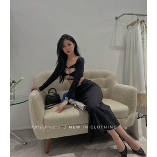 Set áo xoắn + chân váy