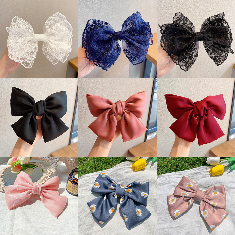 Kẹp tóc kiểu nơ thời trang dành cho nữ