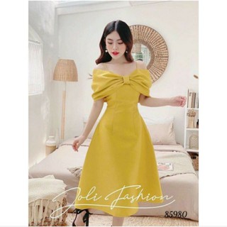 Đầm vàng nơ bẹt vai tiểu thư