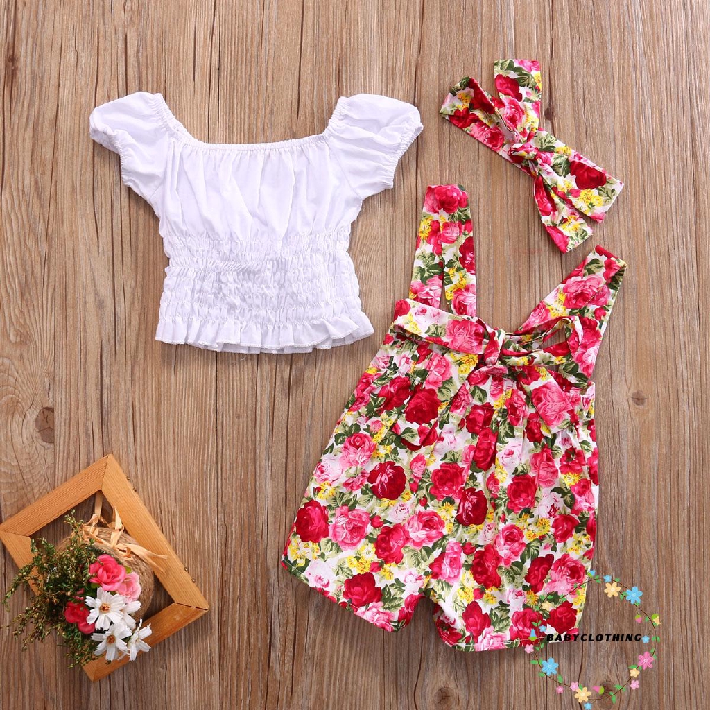 Bộ đồ gồm áo croptop/quần ngắn in hoa và băng đô xinh xắn dành cho bé gái