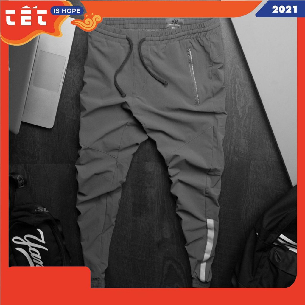 Quần jogger gió chần bắt sáng GJg20203