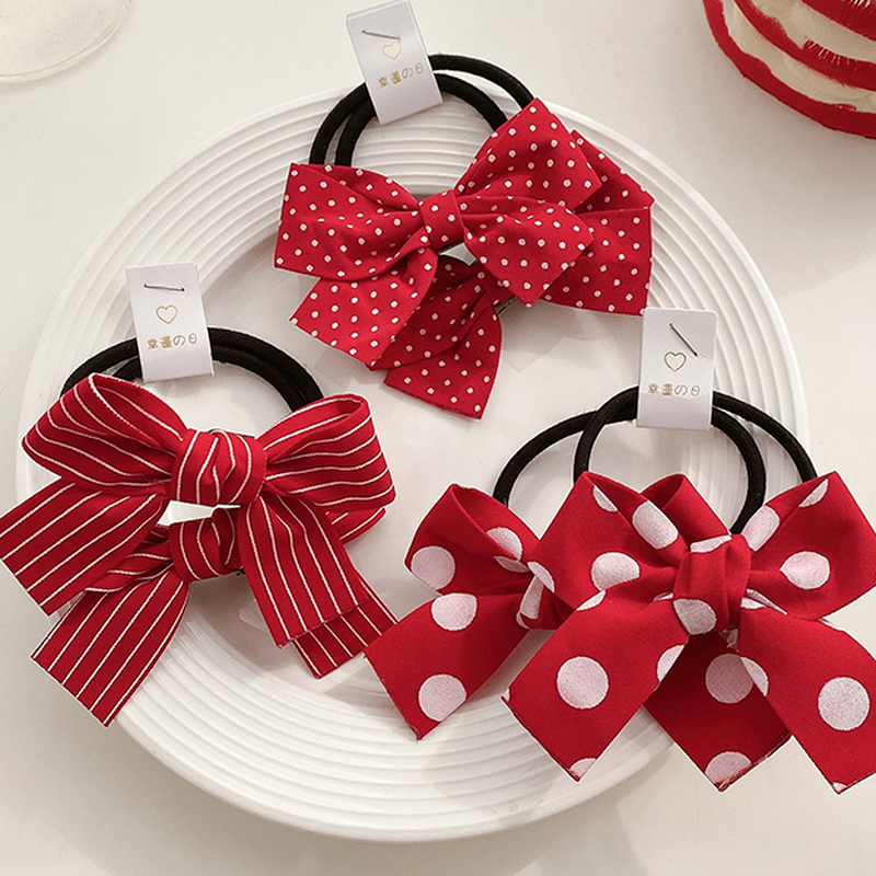 Thun cột tóc gắn nơ dễ thương phong cách Hàn Quốc