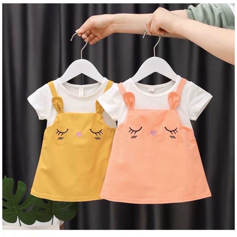 Váy yếm dáng suông hình mắt mèo smile