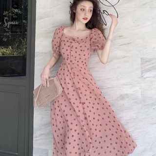 Đầm hồng xoè chấm bi tay bồng