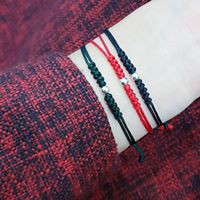 Lắc tay tết bi chỉ đỏ | BigBuy360 - bigbuy360.vn