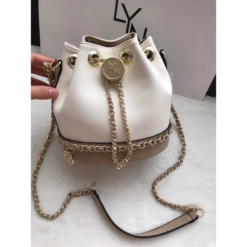 Túi Lyn hobo dây rút viền xích