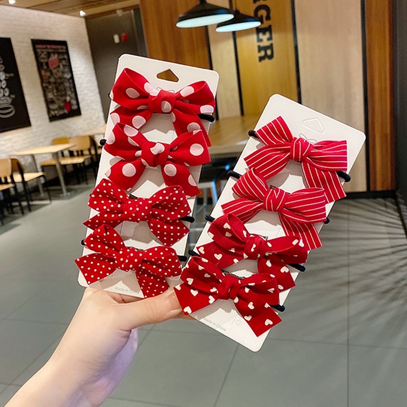 Dây buộc tóc nơ đỏ hoạ tiết xinh xắn cho bé