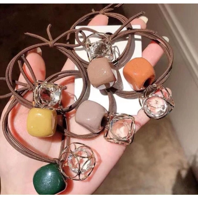 Cột tóc 2 quả sang chảnh cho nữ