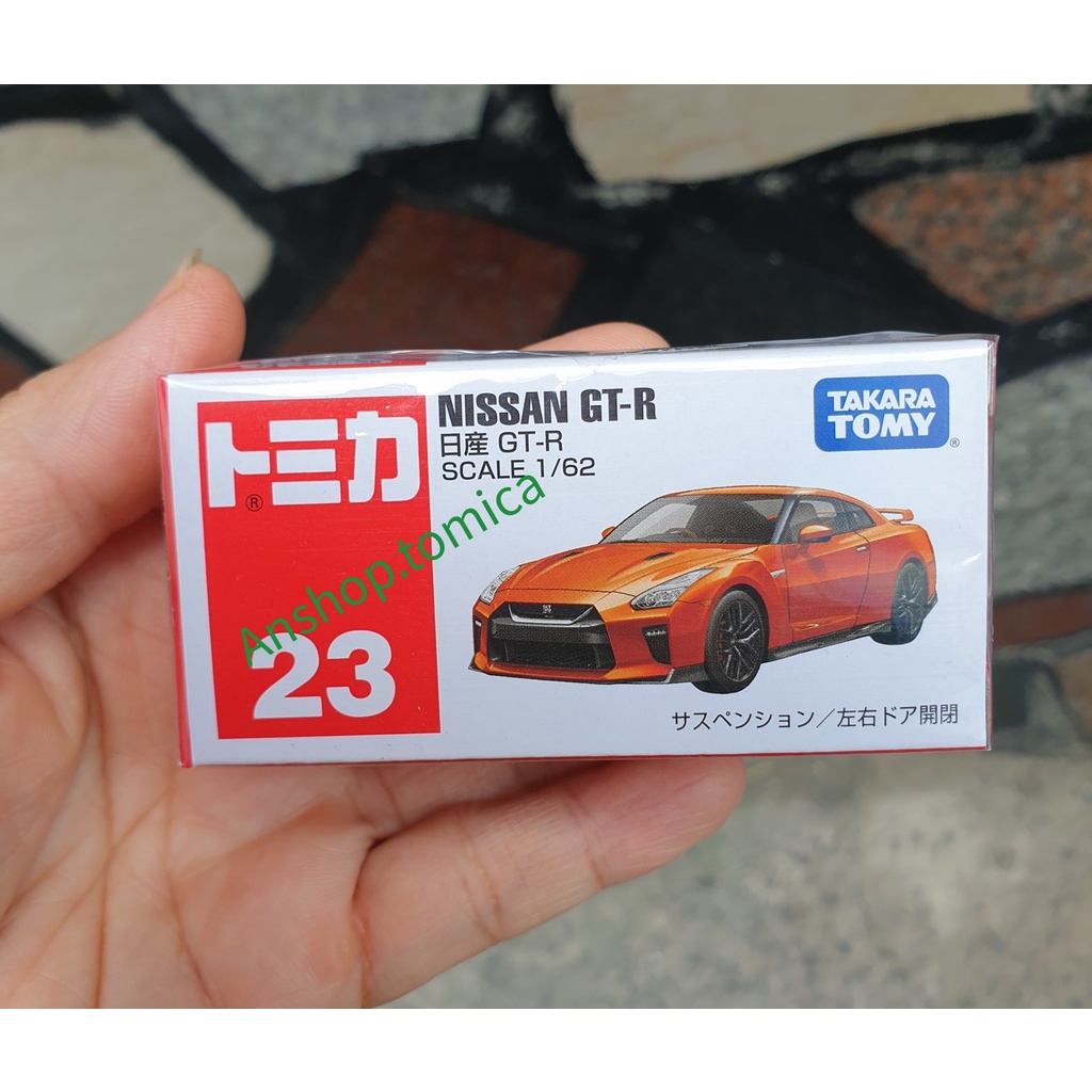 Mô hình xe Nissan GT-R màu đồng mở được cửa tomica Nhật Bản No23