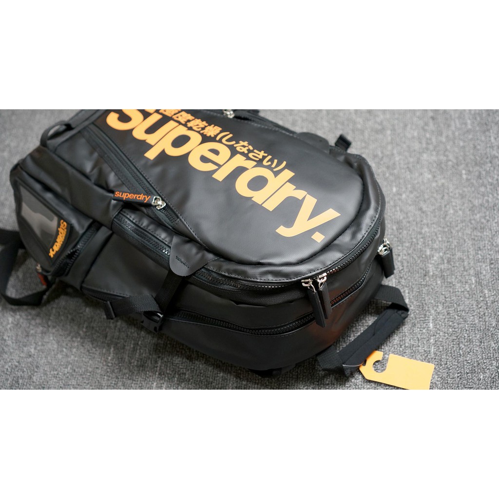 Balo Chống Thấm Nước Superdry Tarpaulin Classic Màu đen/ Đen chữ cam