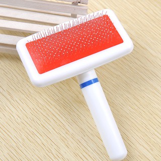 Lược chải xù cán nhựa trắng