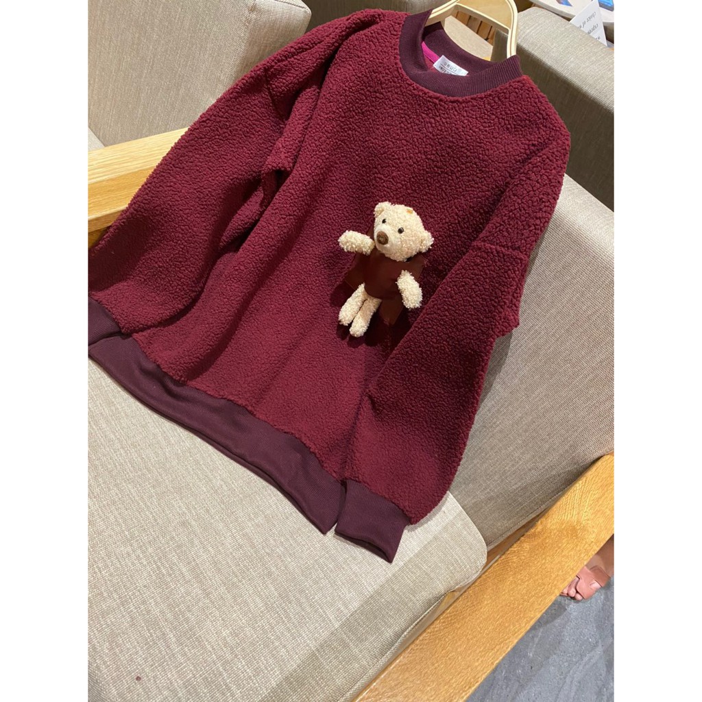 Áo cổ tròn kèm tag túi da Gấu