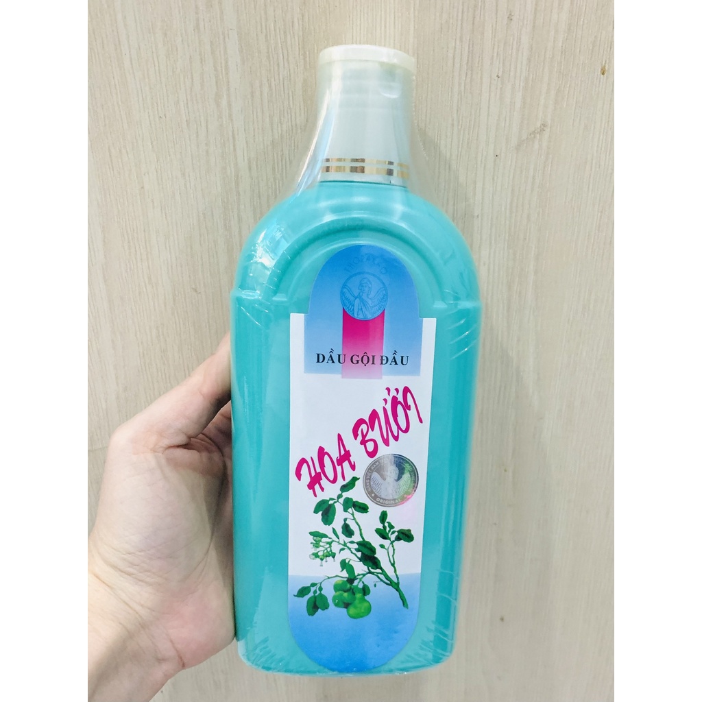 1 CHAI DẦU GỘI HOA BƯỞI THORAKAO 500ML